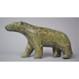 A Large Carved Green Stone Study of a Polar Bear, 23cm Long