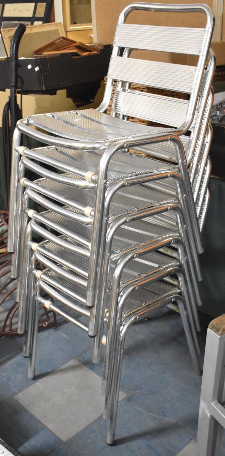 A Set of Six Metal Garden or Patio Ladder Back Chairs
