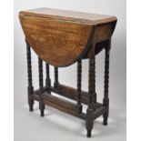 A Mid 20th Century Oak Bobbin Gate Leg Drop Leaf Narrow Occasional Table with Oval Top, 61cm Long