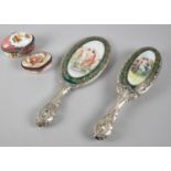 Two Porcelain Boxes and a Continental Dressing Table Brush and Mirror Set