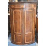 An Inlaid 19th Century Bow Fronted Mahogany Corner Cabinet with Dentil Cornice, 8cm wide and 123cm
