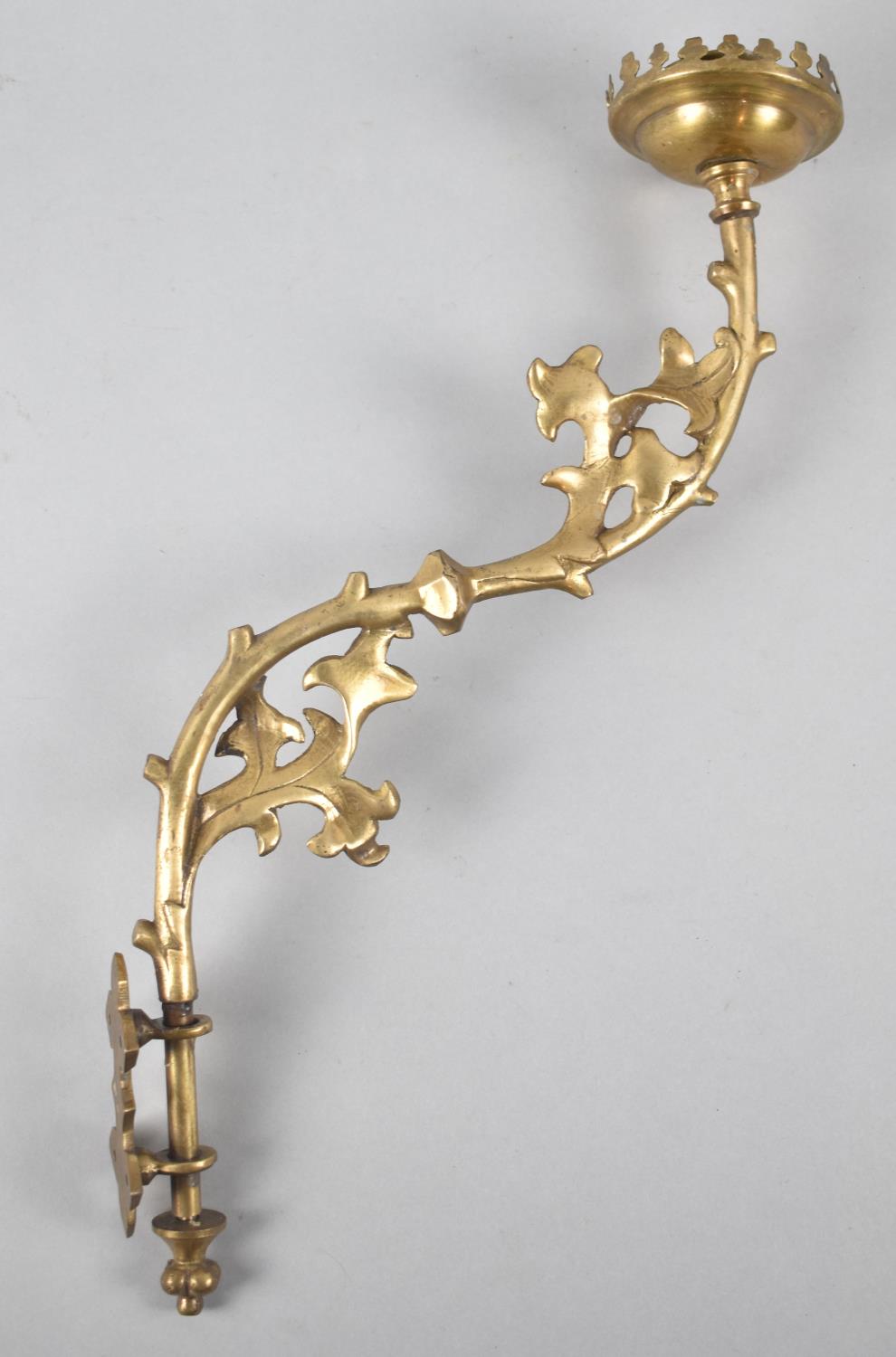 A Wall Mounting Brass Candlestick with Foliate Decoration, 39cm high