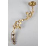 A Wall Mounting Brass Candlestick with Foliate Decoration, 39cm high