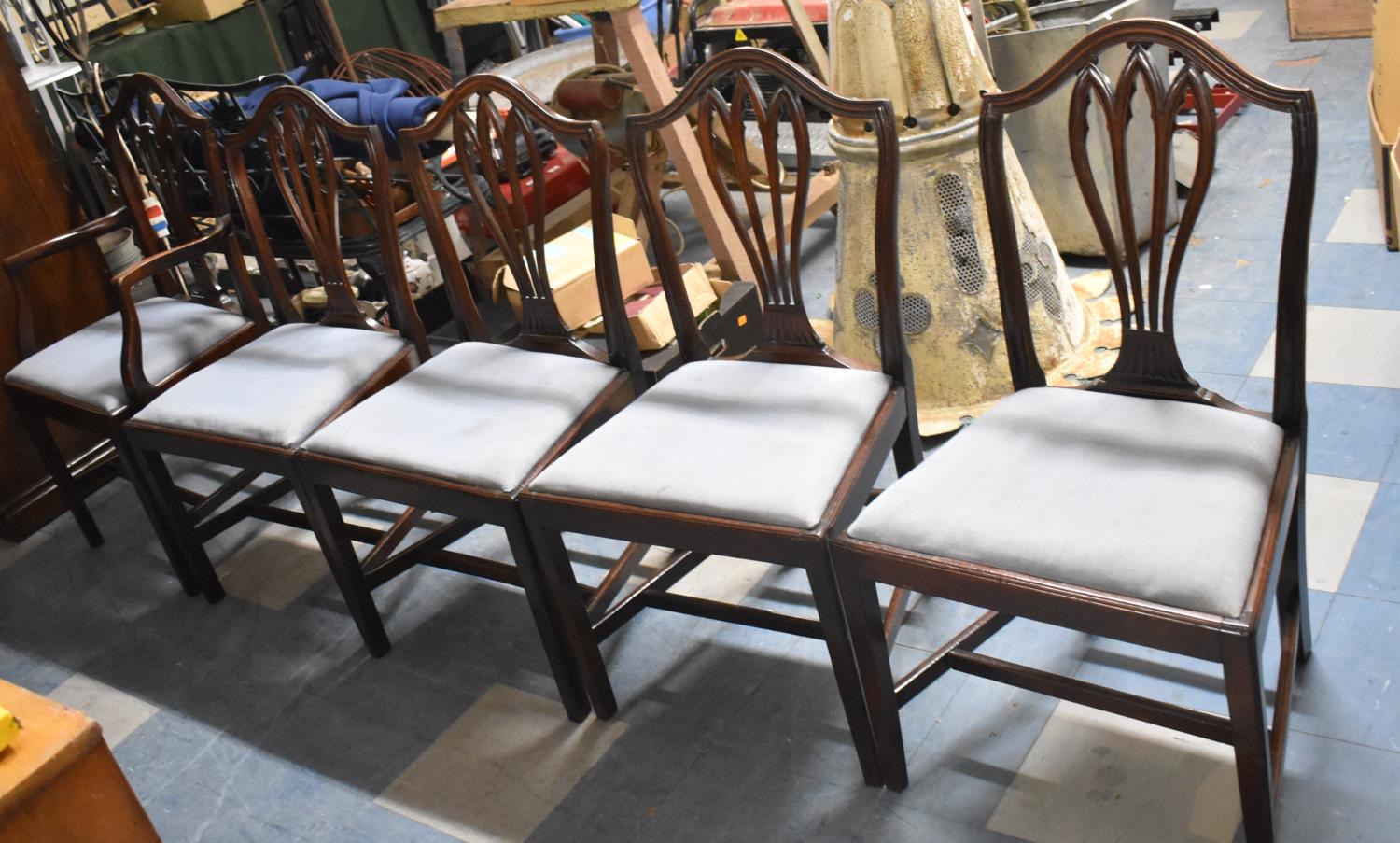 A Set of Five Mahogany Framed Dining Chairs to Include One Carver