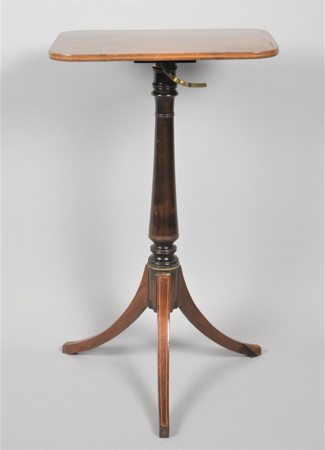 A 19th Century Mahogany Music Stand with Hinged Rectangular Top and Brass Sheet Retainers to Base,