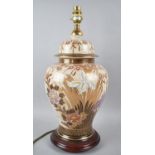 An Oriental Vase Shaped Ceramic Table Lamp Decorated with Flowers and Gilt Highlights, 47cms High