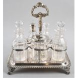 A Silver Plated Seven Bottle Cruet Set, Two of the Glass Bottles with Silver Mounts, Rectangular