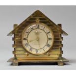 A Mid 20th Century Novelty Brass Alarm Clock in the form of a Swiss Chalet with Clockwork Movement