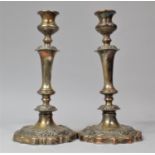 A Pair of Late 19th Century Sheffield Plated Candlesticks, 27.5cms High