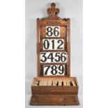 A Late Victorian Oak Wall Hanging Hymns Board with Four Sections for Hymn Numbers and a Box