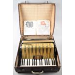 A Vintage Cased Hohner Accordion