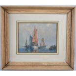 A Framed Print Depicting Fishing Barges at Sunset, 21x17cm