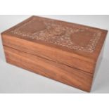 A Modern Indian Hardwood Rectangular Box, the Hinged Lid with Carved Foliate Detail and Brass Inlay,