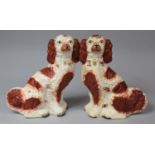 A Pair of Late 19th/Early 20th Century Tall Staffordshire Spaniels, 32.5cm high