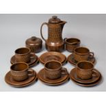 A Wedgwood Brown Glazed Coffee Set to comprise Coffee Pot, Lidded Sugar, Five Mugs, Six Saucers