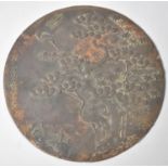 A Signed Japanese Bronze Circular Mirror Decorated with Cranes and Trees, the Signature "Second to