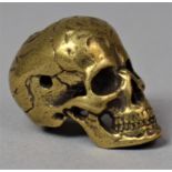 A Bronze Netsuke In the Form of a Skull
