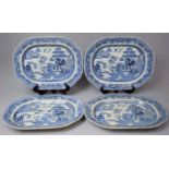 Four Blue and White Willow Pattern Meat Plates, each 43cms Wide