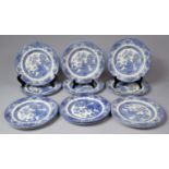 A Collection of English Ironstone Tableware Ltd Blue and White Willow Pattern Dinner Plates, 24.5cms