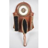 An Edwardian Mahogany Wall Hanging Hall Barometer with Three Clothes Brushes