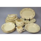 A Set of Clarice Cliff Floral Decorated Dinnerwares to comprise Jugs, Bowls , Plates, Platters,