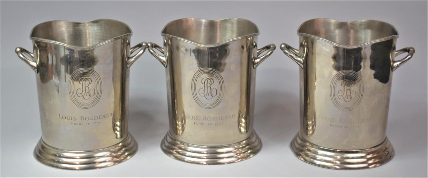 A Set of Three Silver Plated Louis Roederer Champagne Buckets, each 23.5cm high