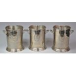 A Set of Three Silver Plated Louis Roederer Champagne Buckets, each 23.5cm high