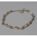 A Coral Mounted Silver Filigree Bracelet