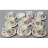 A Royal Crown Derby Floral Decorated Coffee Set to comprise Milk Jug, Sugar Bowl, Eight Saucers