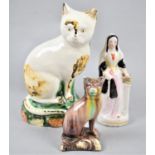 A Staffordshire Figure of Maiden with Book Together with Two Continental Glazed Figures of Seated