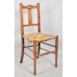 A Rush Seated Arts and Crafts Bedroom Chair