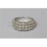 A Diamond and Silver Faux Triple Bound Ring Having Baguette and Round Diamond Clusters, Size M