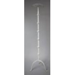 A Tall White Painted Wrought Iron Candle Pricket on Tripod Stand, 102cm high