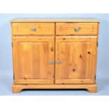 A Modern Pine Side Cabinet with Two Drawers Over Cupboard Base, 97cm Wide