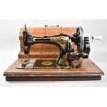 A Vintage Cased Sewing Machine