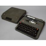 A Vintage Empire Aristocrat Cased Manual Portable Typewriter