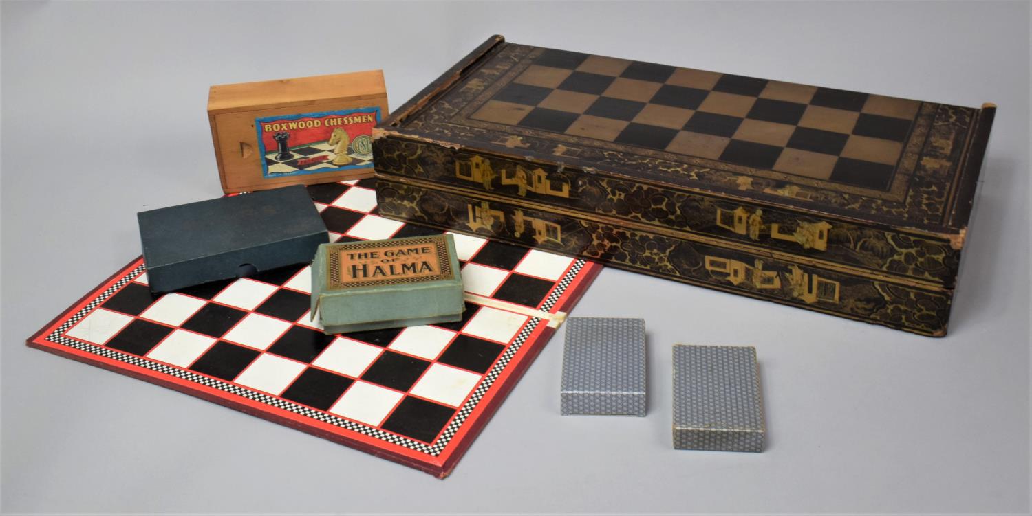 An Early 20th Century Lacquered Wooden Games Box with Chinoiserie Decoration, the Outer Surface with