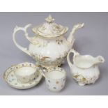 An Early/Mid 19th Century Coalport Teapot and Matching Cream Jug Decorated with Gilt Highlights