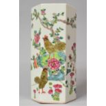 A 20th Century Chinese Vase of Hexagonal Panelled Form Decorated with Allied Enamels Depicting