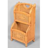 A Modern Bamboo and Wicker Two Tier Magazine Stand,