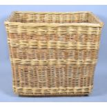 A Modern Welsh Wicker Laundry Basket, 69cm x 52cm x 60cm high