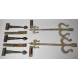 A Collection of Cast Metal Door Mounts and Hinges, the Longest 60cm