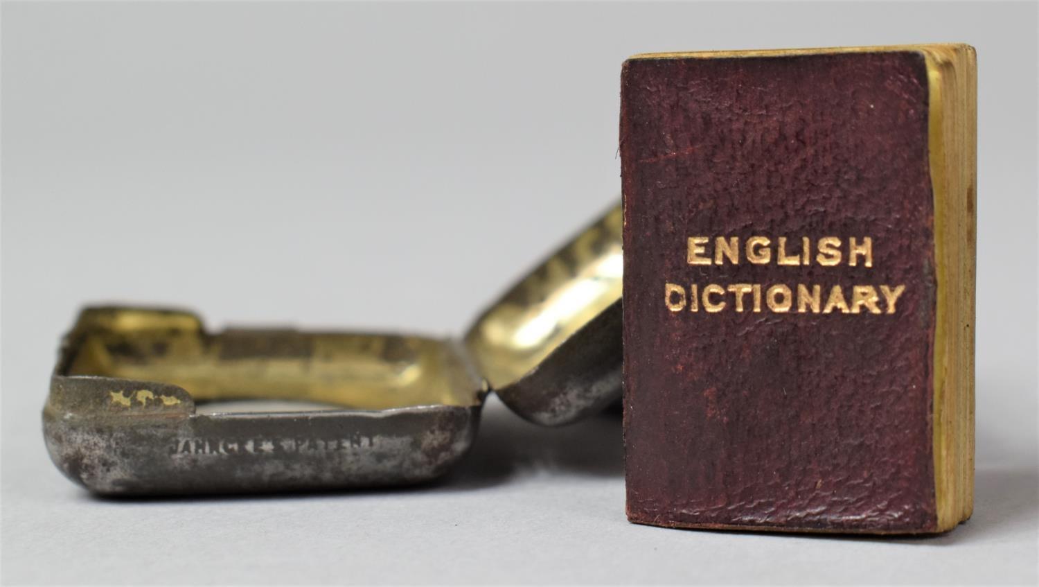 A Novelty "World's Smallest Dictionary", the Case having in Built Magnifying Glass - Image 3 of 4