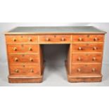 A Late Victorian/Edwardian Kneehole Desk with Centre Drawer Flanked by Four Short Drawers, Tooled