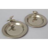 A Pair of Small White Metal Place Card Name Holder/Pin Dishes with Bird Mounts, Each 7.75cm Diameter