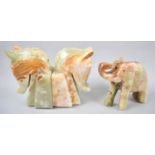 A Pair of Onyx Horseheads Bookends and a Carved Onyx Elephant with Trunk in Salute, Bookends 16cm