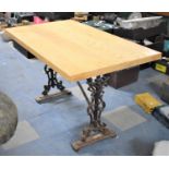 A Modern Rectangular Wooden Topped Wrought Iron Based Table, 120x70cm