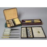 A Collection of Various Boxed Cutlery to comprise Banded Knives, Carving Set, Part Set of Teaspoons,