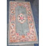 A Patterned Woollen Chinese Hearth Rug, 121x61cm
