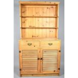 A Modern Pine Kitchen Dresser with Two Drawers Over Louvred Cupboard Base, Two Shelf Plate Rack,